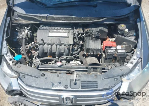 2011 Honda Insight from USA, damaged, VIN JHMZE2H37BS003597